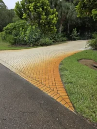 Driveway with iron stains from irrigation system